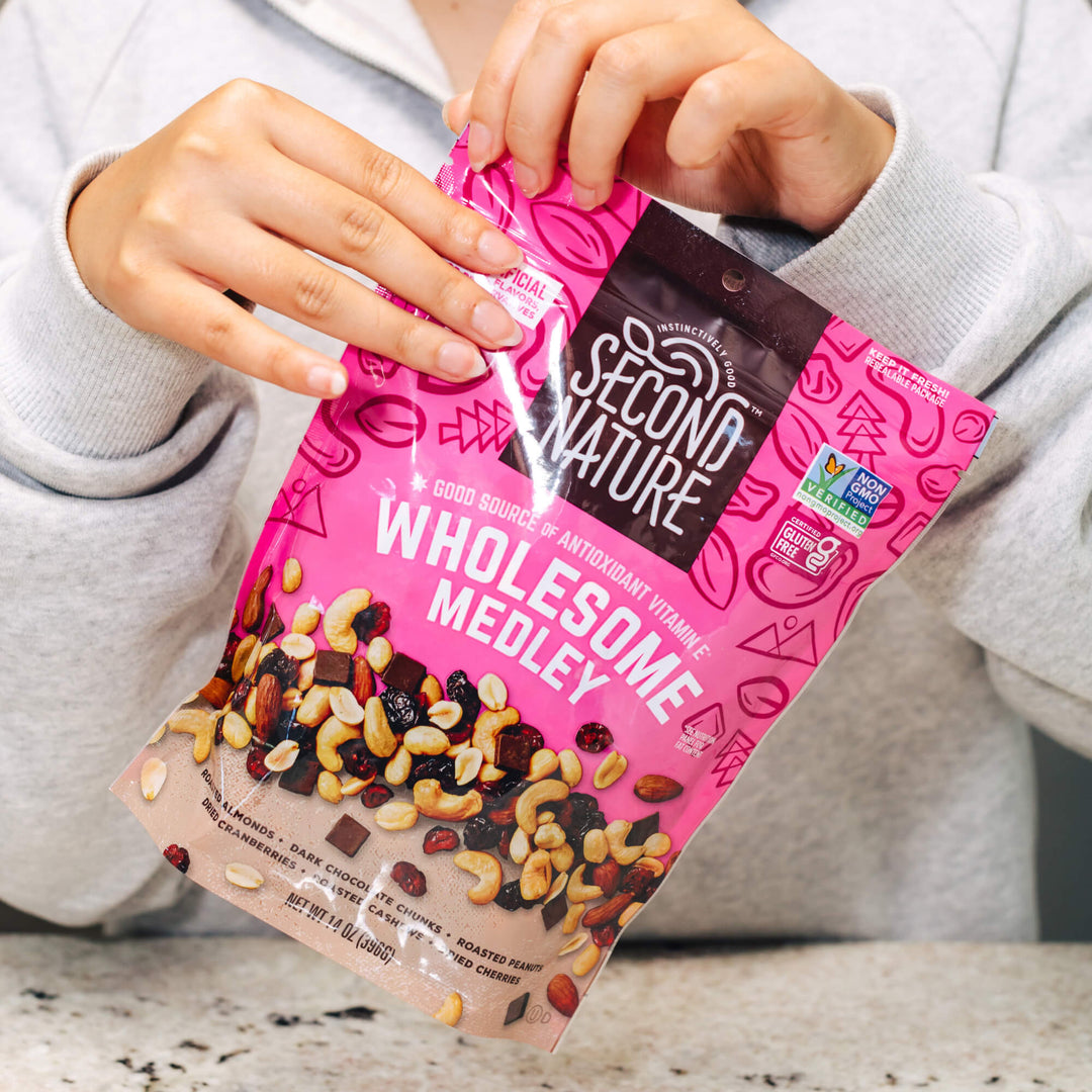 Opening bag of Wholesome Medley Trail Mix - 5 oz.